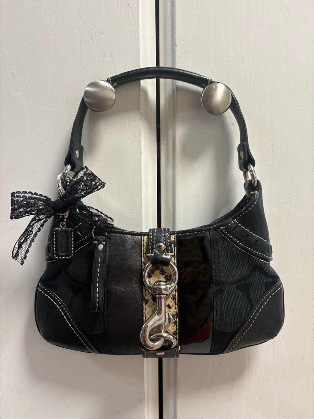 Authentic 2006 coach black signature canvas and leather mini hamptons